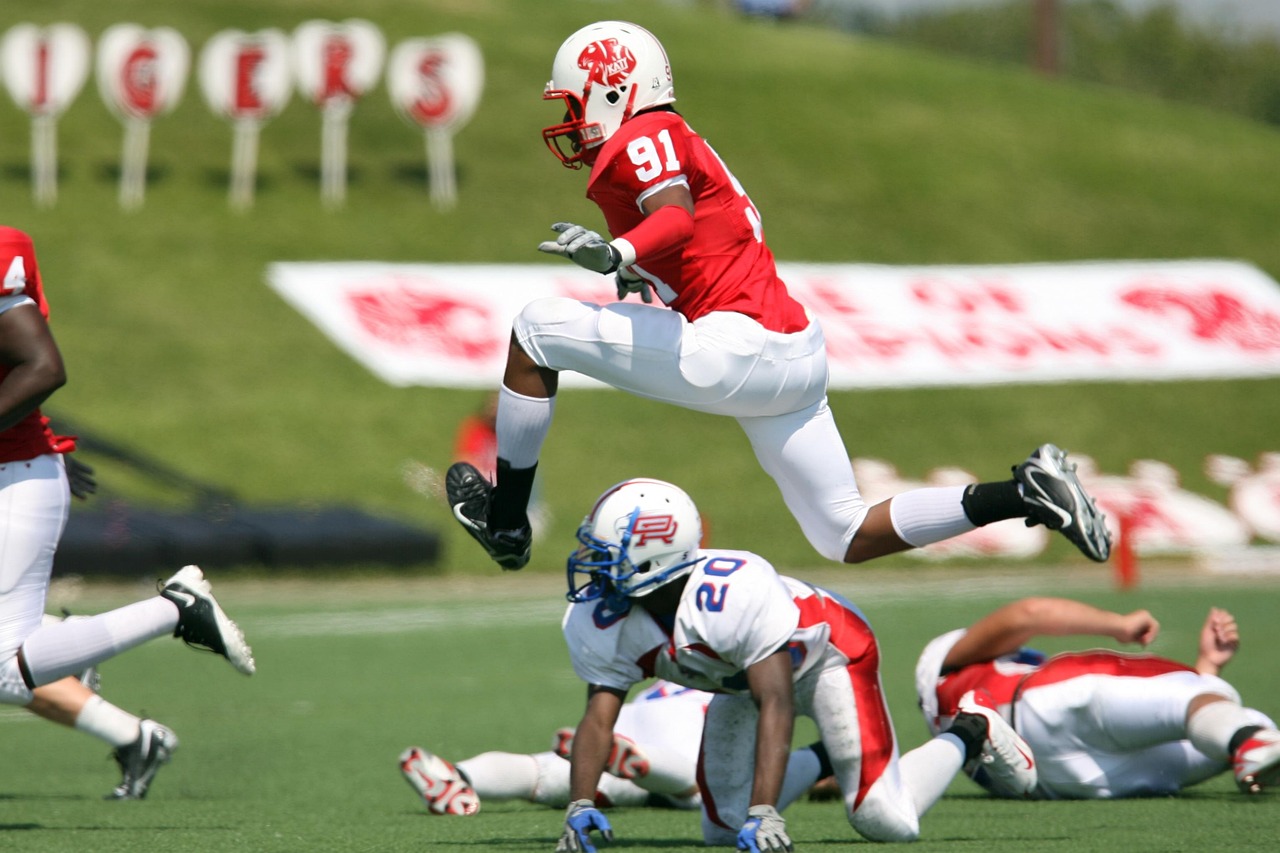 Exploring American Football Teams with Red Jerseys