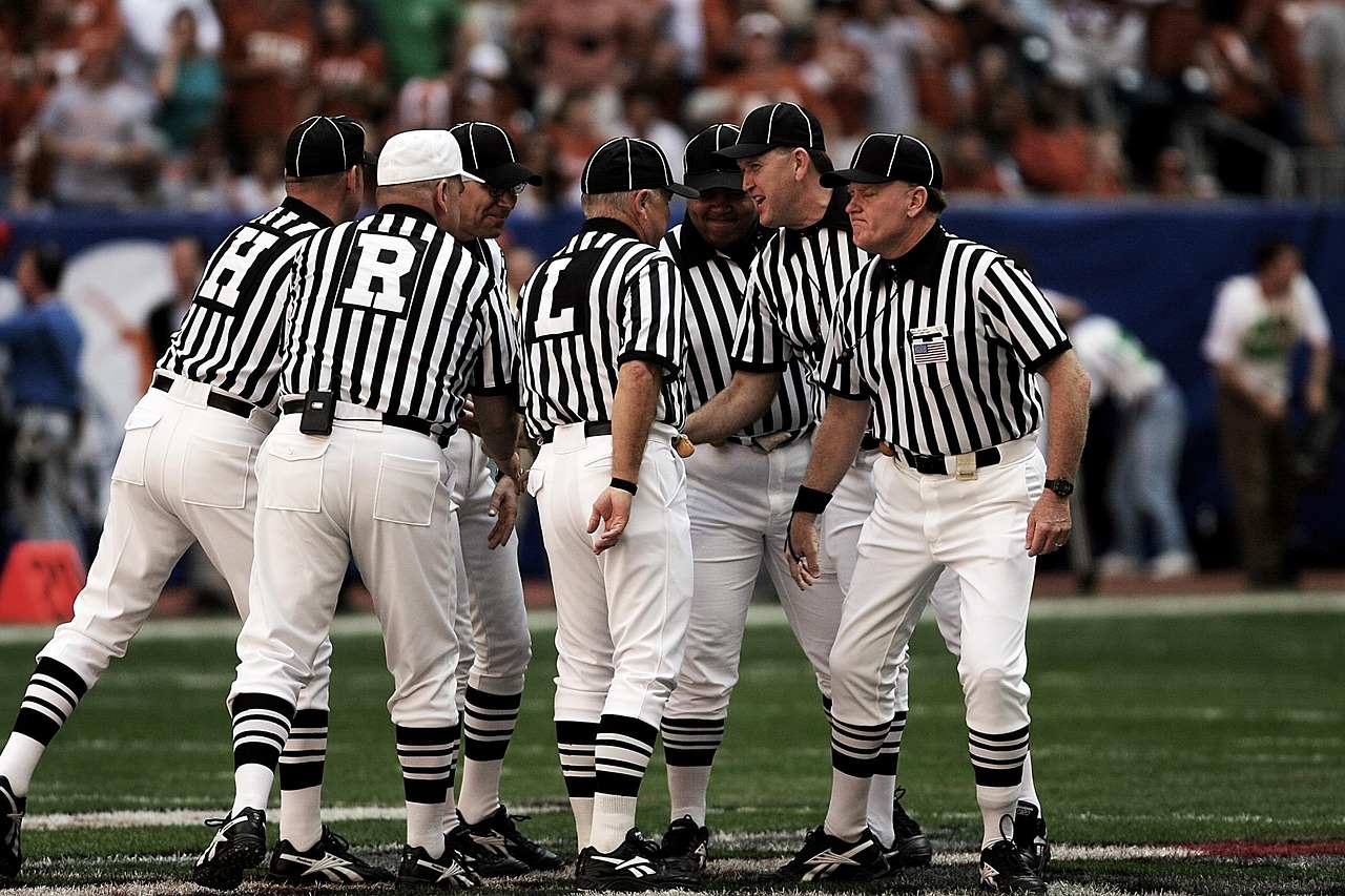 Referee Signals in American Football: A Comprehensive Guide